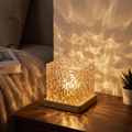 Ocean wave projector lamp - Crystal Cube Ocean Wave Lamp casting ripples in a bedroom