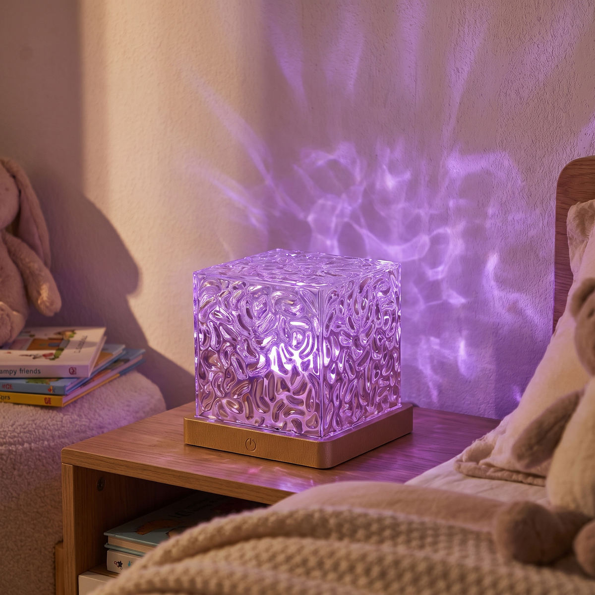 Ocean wave projector lamp - Crystal Cube Ocean Wave Lamp glowing purple in a kids room
