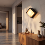 Outdoor wall light - Diamond Outdoor Wall Light beside a garage door at blue hour