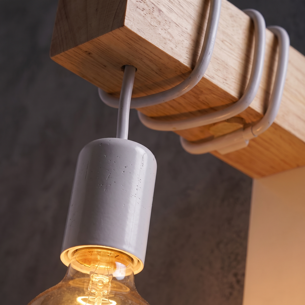 Close-up of the timber arm and metal fitting of the Modern Industrial Wall Sconce