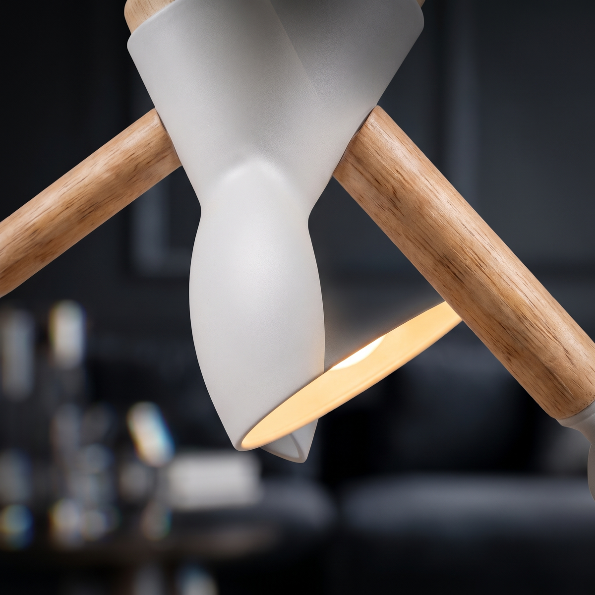 Close-up of the timber frame and adjustable head of the desk lamp