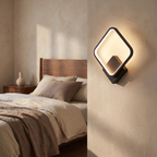Modern LED Wall Sconce beside a bed