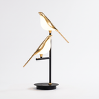 Perched Bird Table Lamp on white background