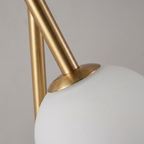 Brass Bar and Opal Globe Wall Sconce detail