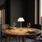 Ribbed Dome Cordless Table Lamp on a dinner table casting scalloped light