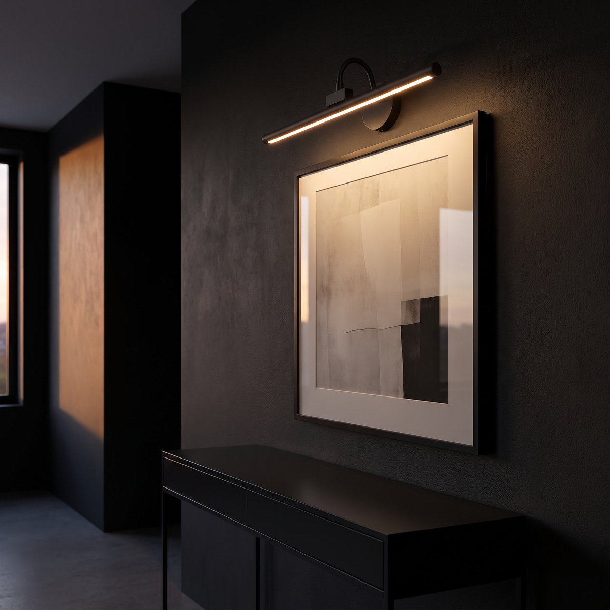 Rechargeable LED Picture Light lighting a framed print above a black console in a dark hallway