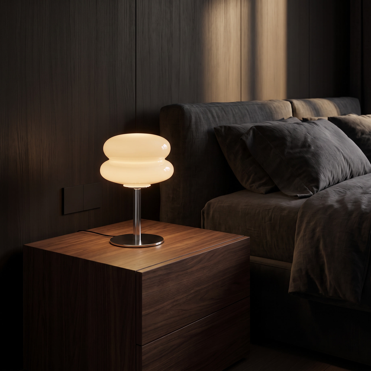 Modern Glass Mushroom Table Lamp on a walnut bedside table in a dark bedroom