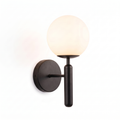 Modern Glass Globe Wall Sconce in black on a white background