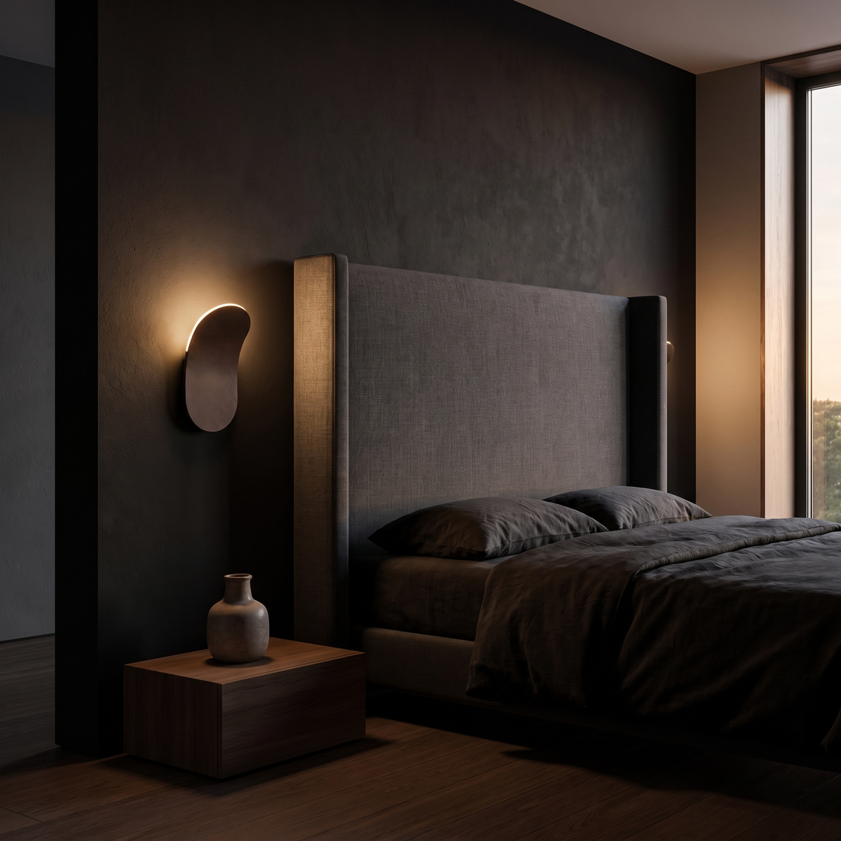 Wave-Form LED Wall Sconce shown to scale beside a bed headboard