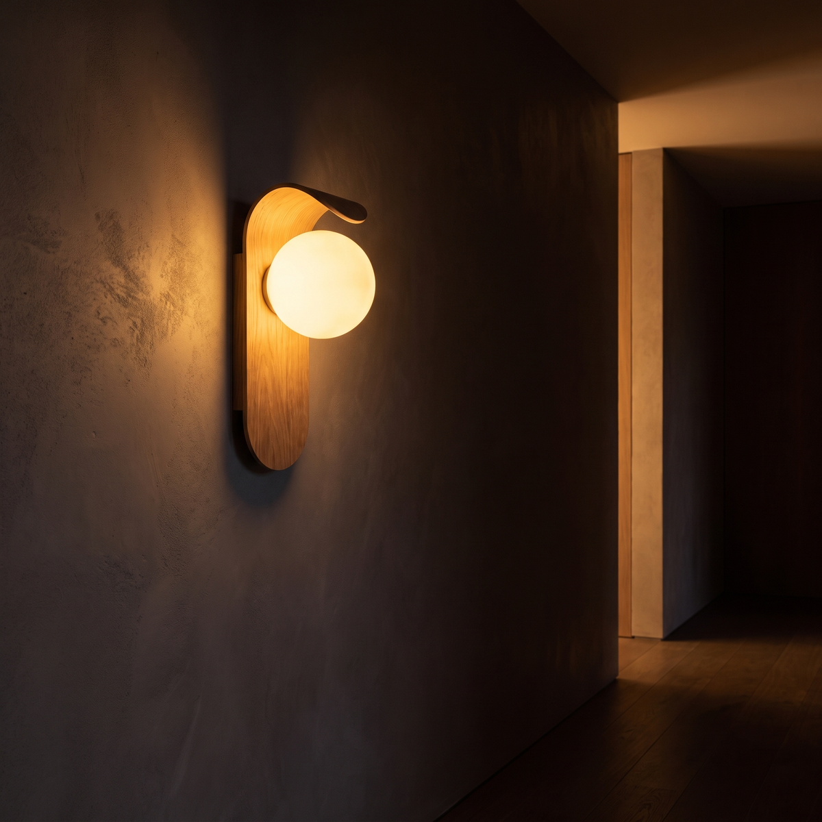 Oval Timber LED Wall Sconce mounted in a dark hallway washing the wall with warm light