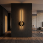 Cordless Brass Bar Wall Sconce mounted in a dark hallway washing the wall with warm light