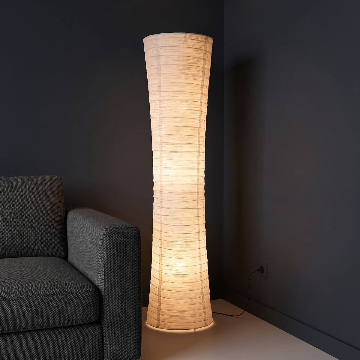 Rice Paper Column Floor Lamp shown to scale in the corner beside a sofa