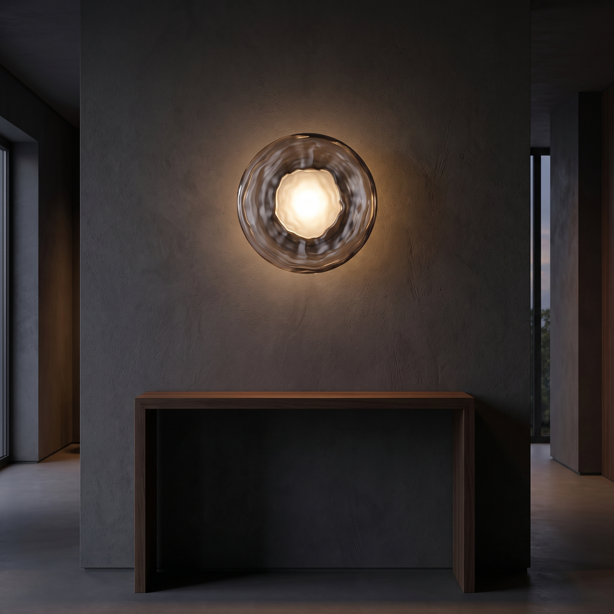 Glass disc wall sconce shown to scale, mounted on a hallway wall above a console table