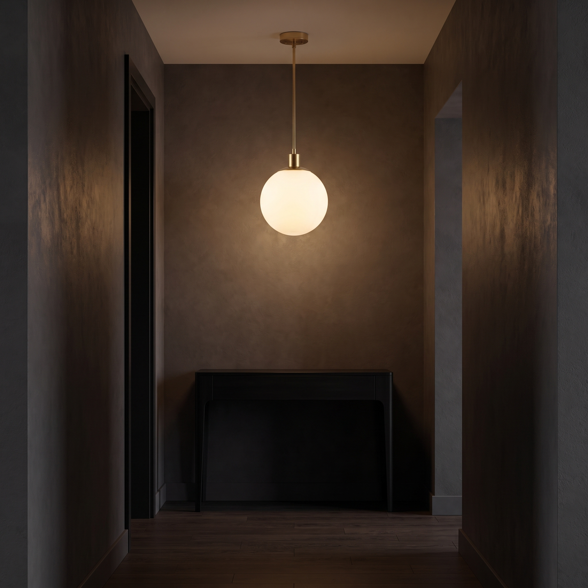 Milk glass globe pendant light shown to scale in a narrow entry hallway above a console table