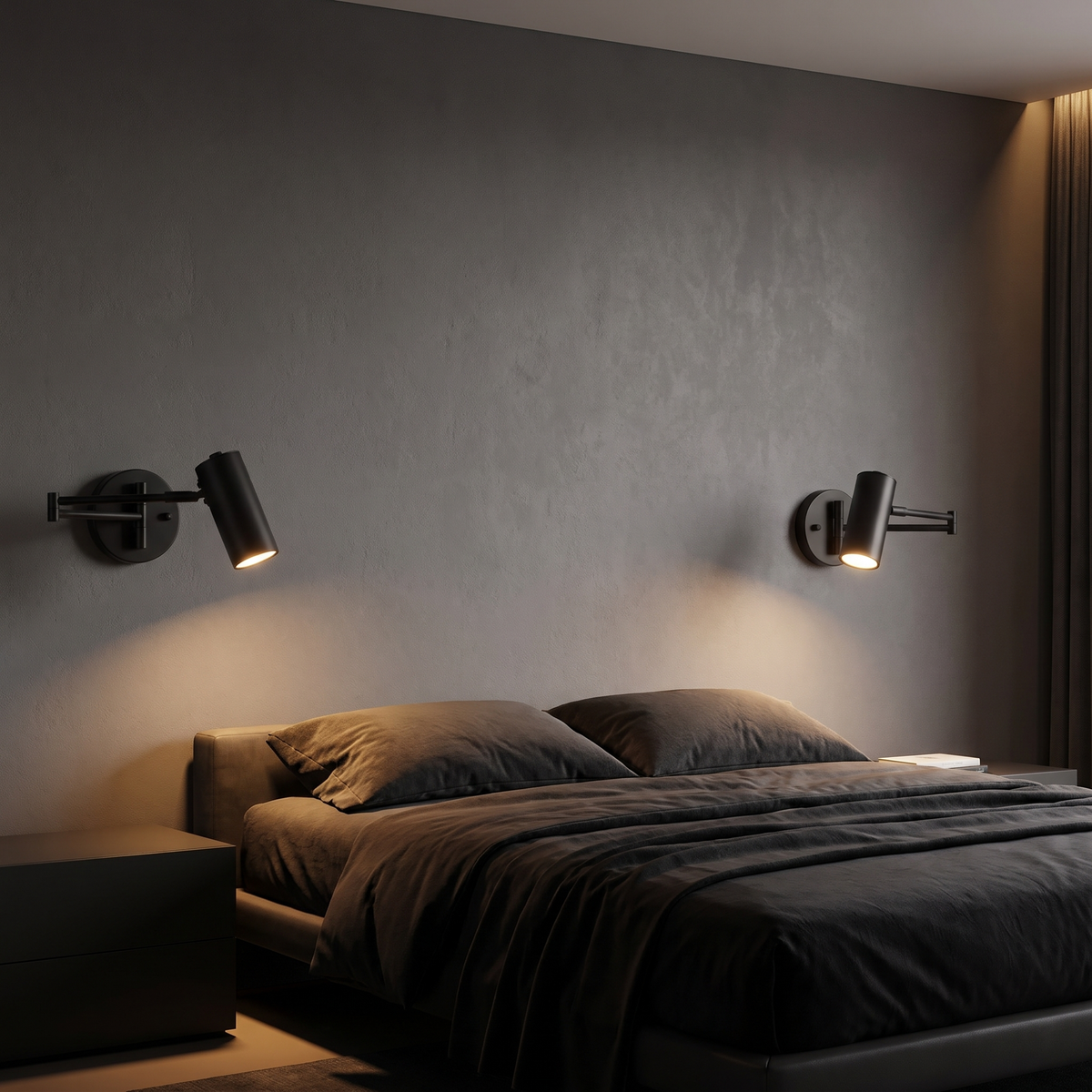 Black swing arm cylinder wall sconces, a pair either side of a bed