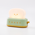 Toaster Night Light in green on white background