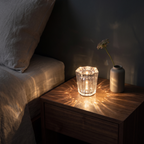 Cordless Crystal Table Lamp on a walnut nightstand at night