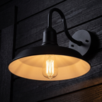 Close-up of the Gooseneck Barn Light shade and filament bulb