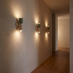 Two-Tone Up Down Wall Sconces lighting a hallway