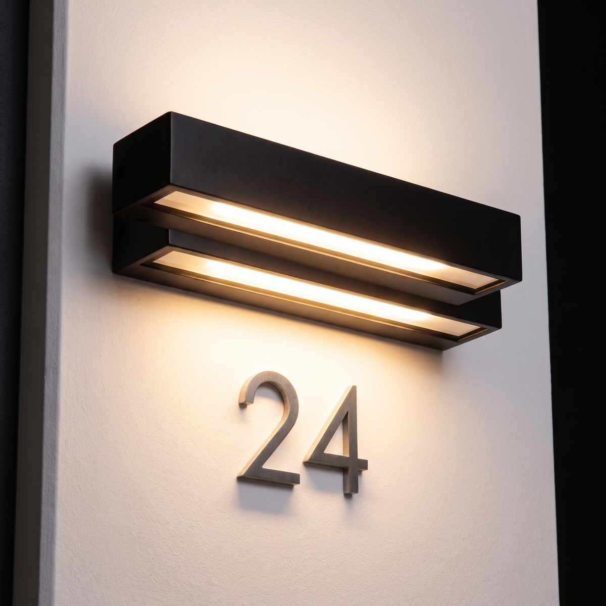 House Number Light above house numbers on a white rendered wall