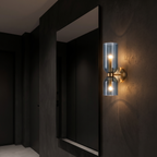 Glass Up Down Wall Sconce in a dark entryway