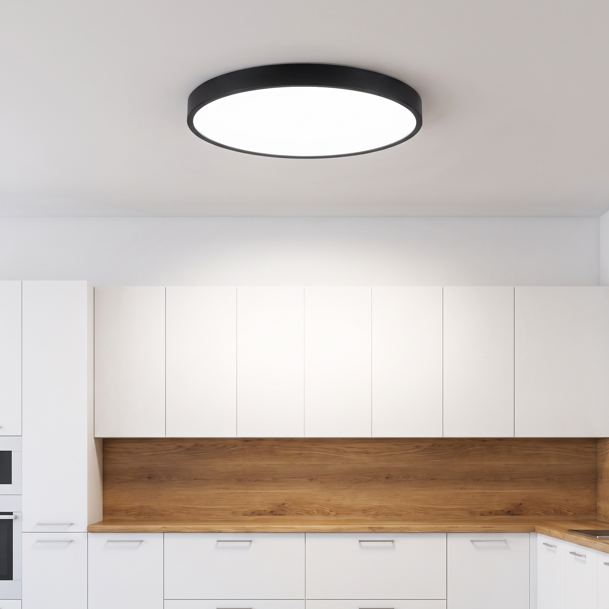 Slim Round LED Flush Mount Ceiling Light showing its 2 in profile in a kitchen