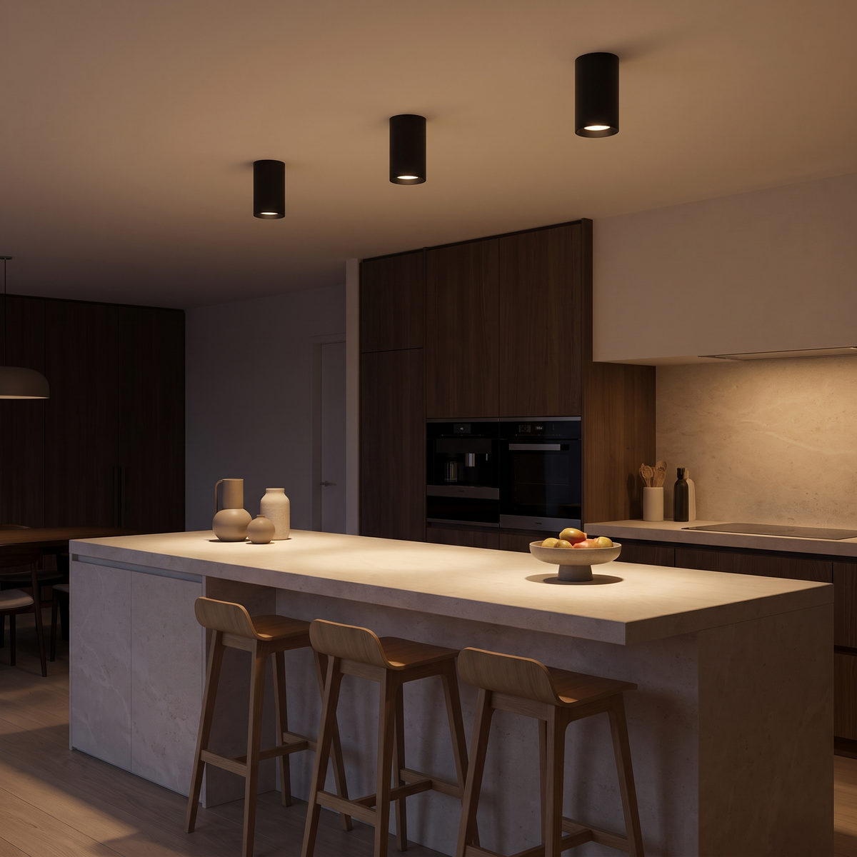 Three black Cylinder LED Ceiling Spotlights over a kitchen island, shown to scale