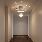 Crescent Moon Ceiling Light projecting stars on a hallway ceiling at night