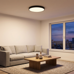 Slim Round LED Flush Mount Ceiling Light in black above a living room, shown to scale