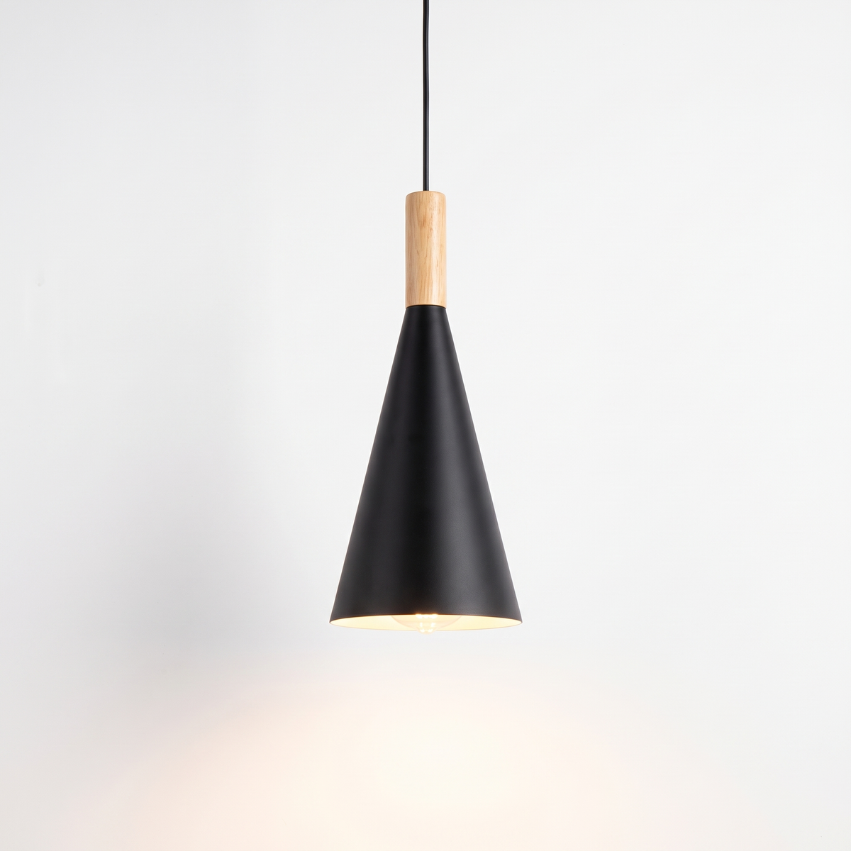 Black Nordic cone pendant light on white background