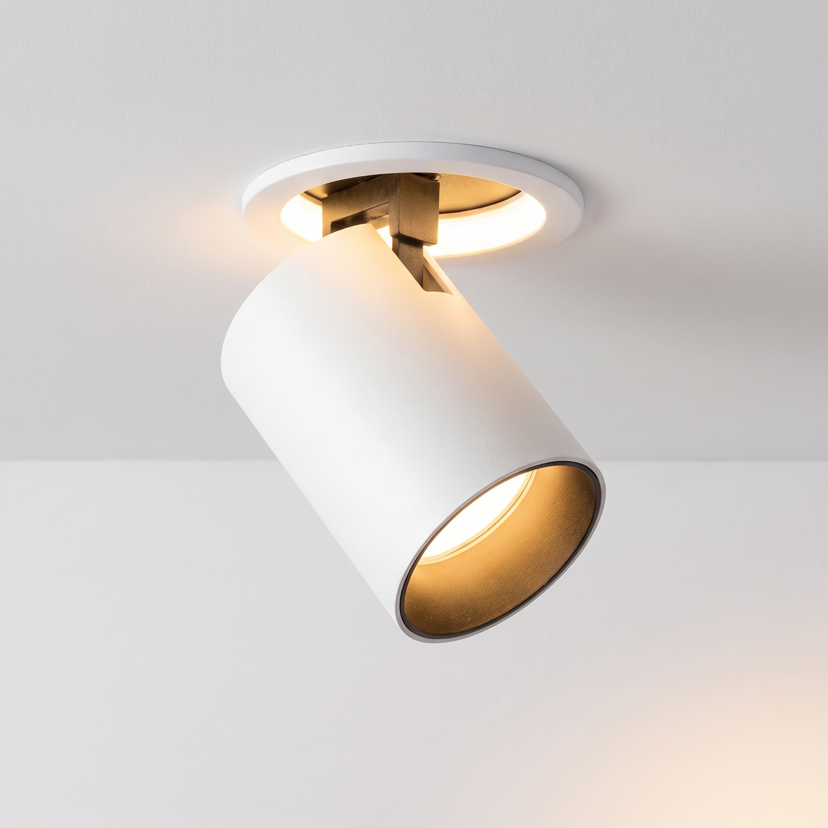 Close-up of recessed spotlight with head folded out