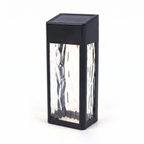 Black solar wall lantern with ripple glass on white background