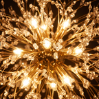 Starburst Crystal Chandelier close-up of the gold rays and crystal-look drops