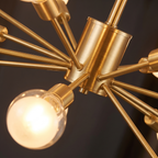 Sputnik Semi Flush Ceiling Light close-up of the gold hub and globe bulb