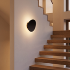 Tilted Disc LED Wall Sconce in a stairway