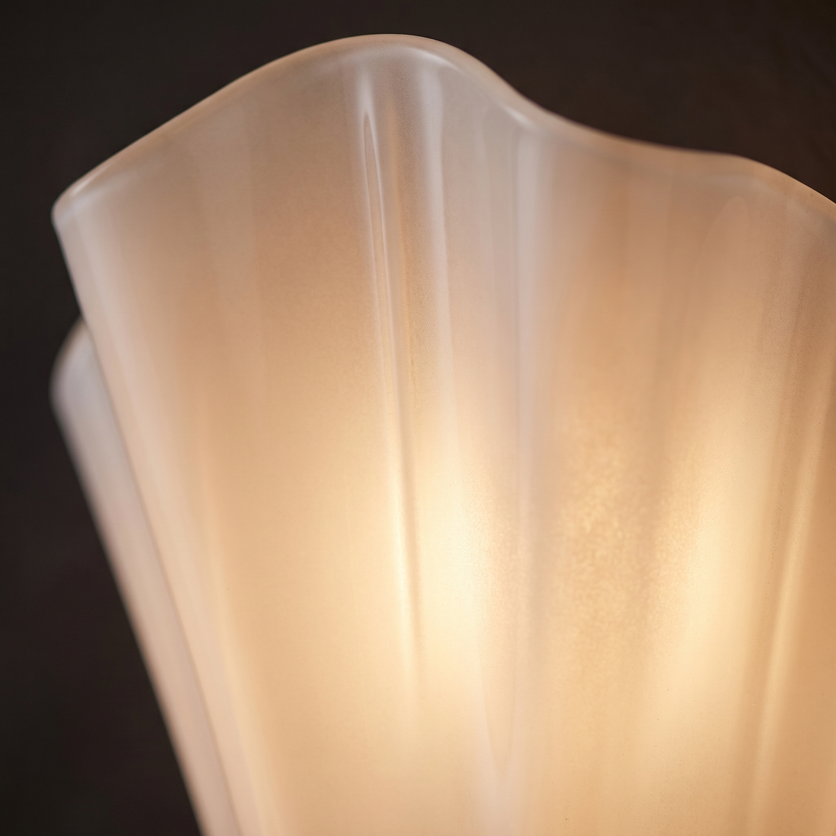 Fluted Glass Shell Wall Sconce close-up of the fluted glass