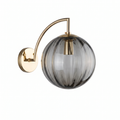 Ribbed Glass Globe Wall Sconce in Smoky Gray on white background