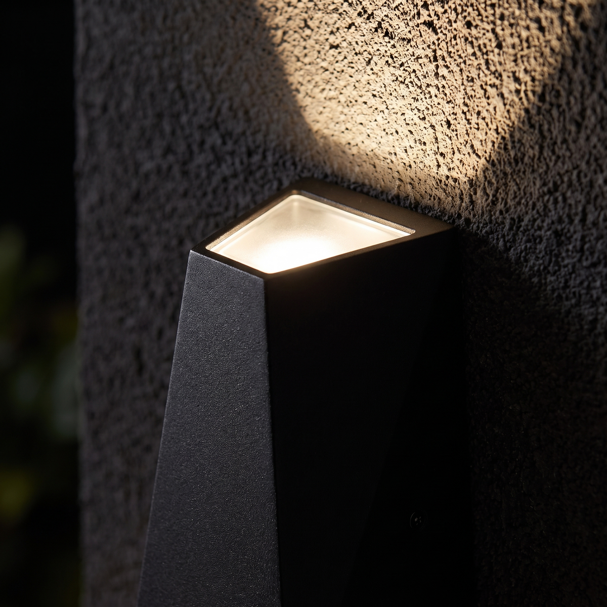 Angled Up Down LED Wall Light close-up of the angled aluminum body and light beam