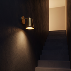 Bell LED Wall Light in a dark modern stairway
