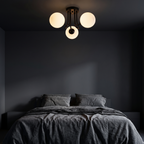 Three Globe Semi Flush Ceiling Light in a dark modern bedroom