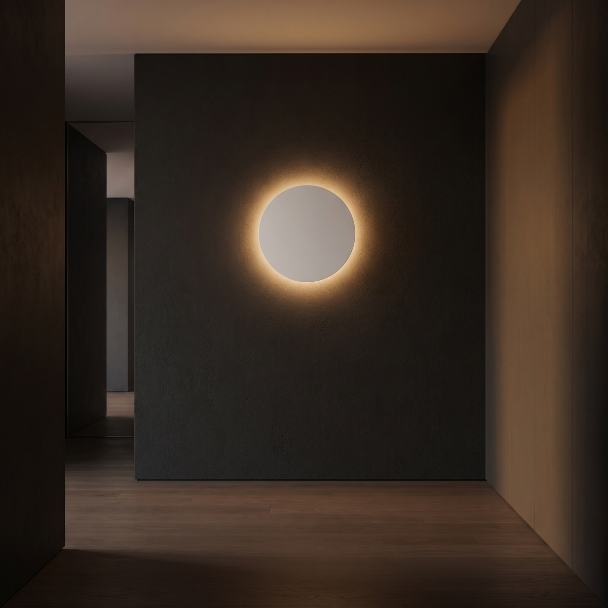 Eclipse Round LED Wall Light in a dark modern hallway