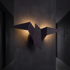 Origami Bird Wall Sconce in a dark modern hallway