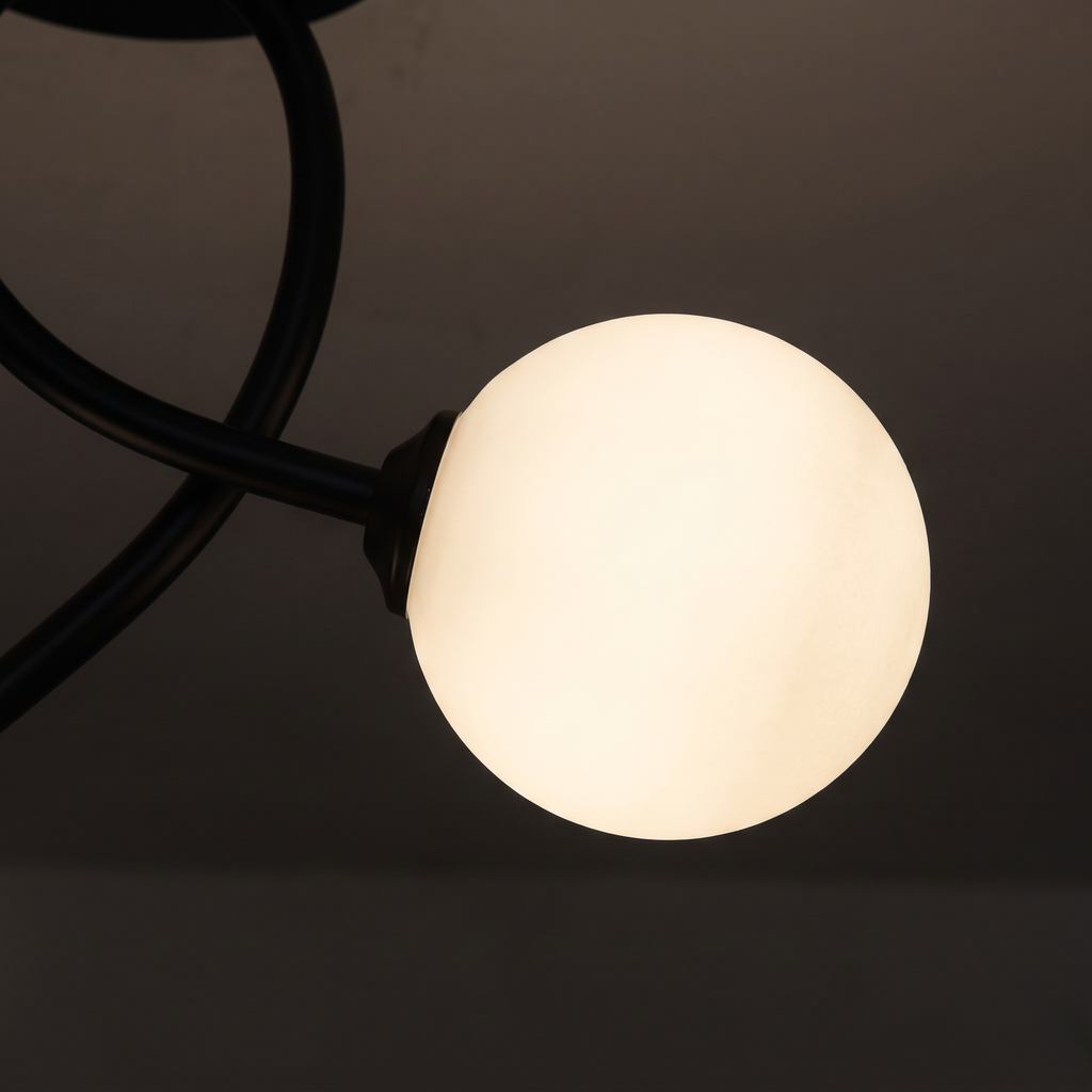Curved Two-Light Glass Globe Ceiling Light close-up of the opal glass globe and curved arm
