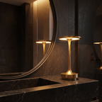 Cordless Disc Table Lamp on a bathroom vanity