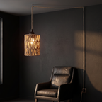 Woven Rattan Plug-In Pendant Light over a reading chair