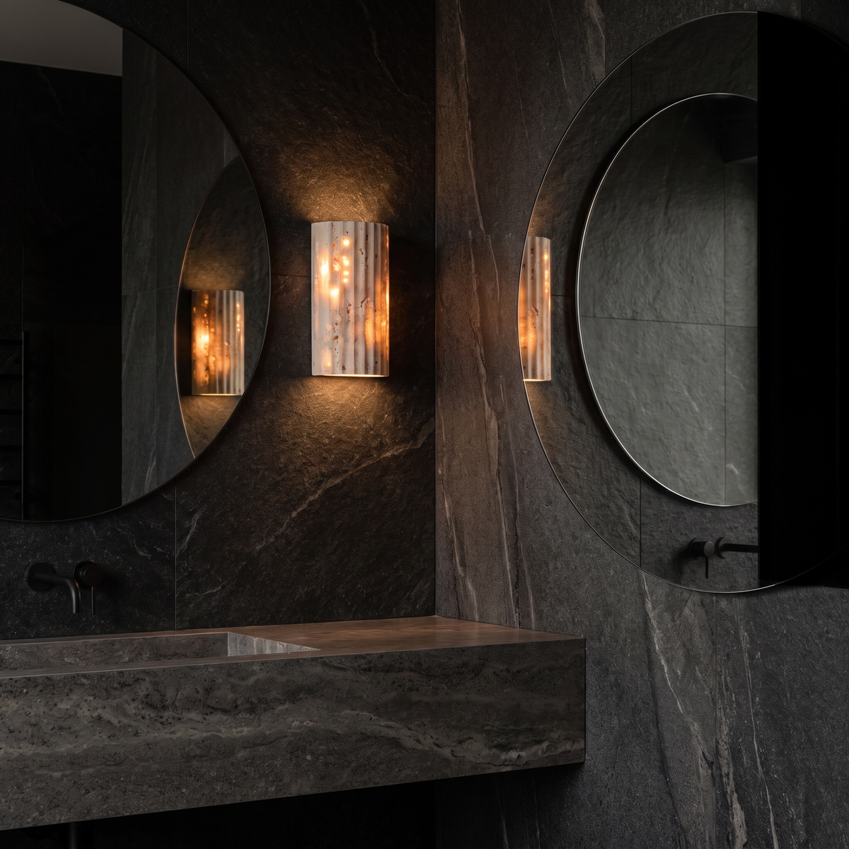 Fluted Stone Look Wall Sconce in a dark bathroom