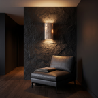 Fluted Stone Look Wall Sconce above a lounge chair