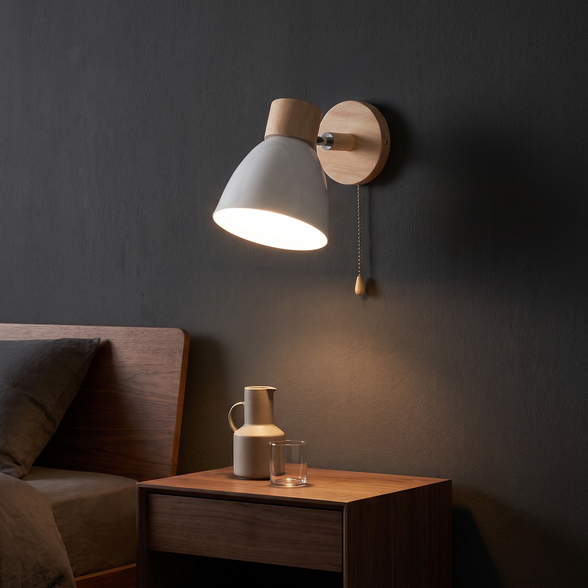 Nordic Wood Wall Sconce with Pull Chain above a bedside table