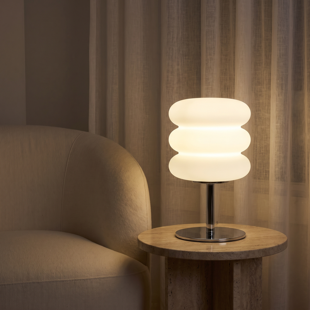 Modern Stacked Mushroom Table Lamp on a travertine side table in a reading corner