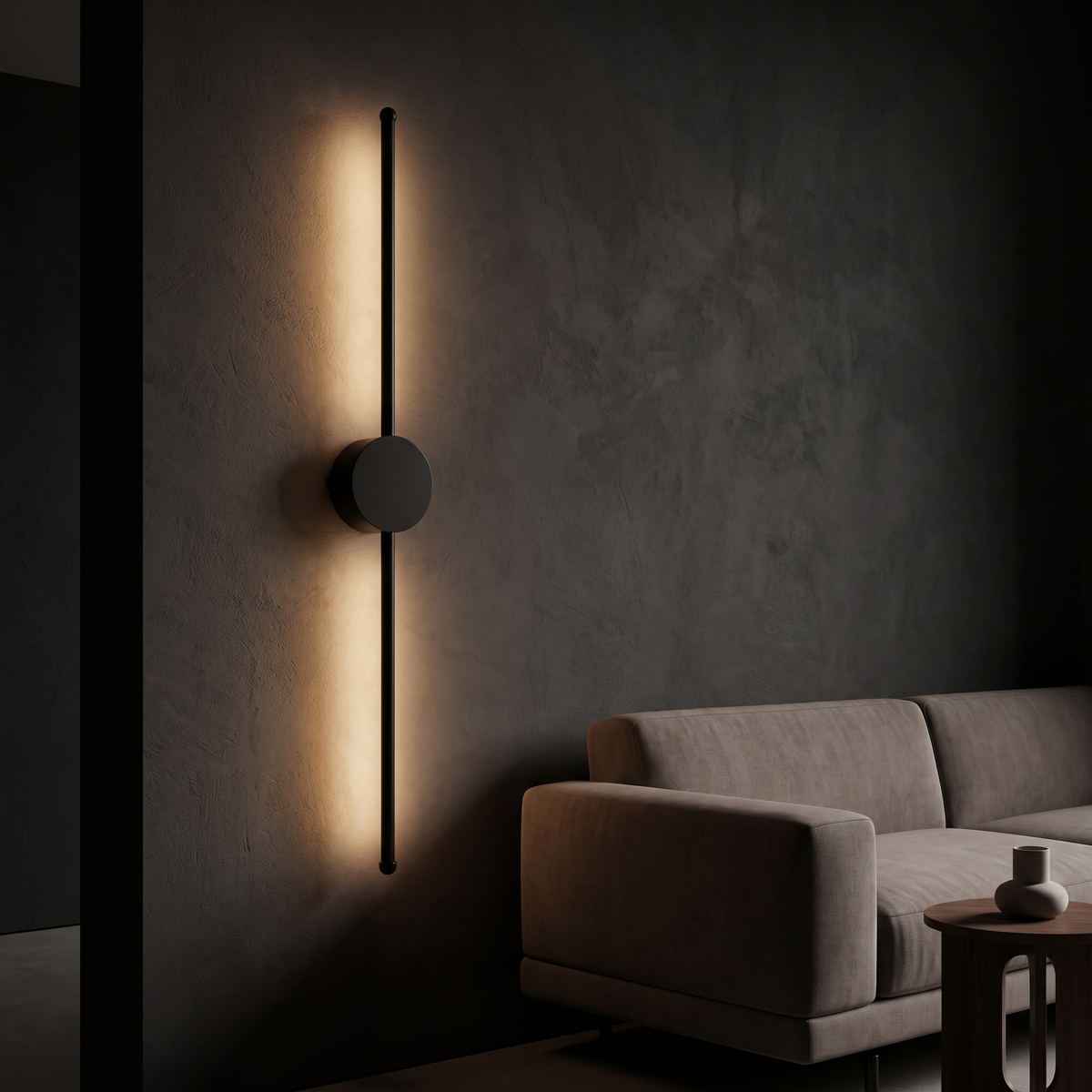Modern Linear LED Wall Light mounted vertically beside a sofa in a dark living room